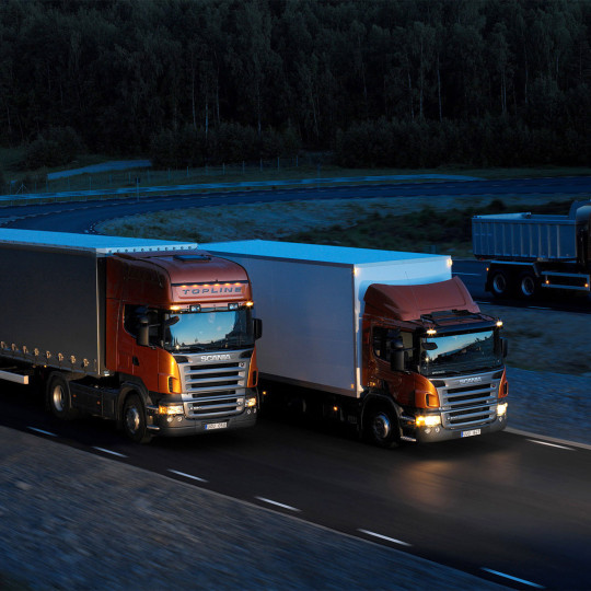 http://cargo2268.ru/wp-content/uploads/2015/09/Three-orange-Scania-trucks-540x540.jpg